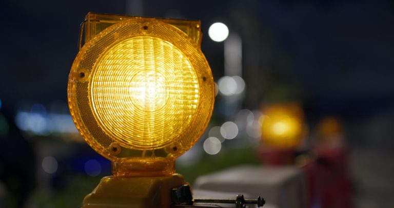Yellow caution light at street