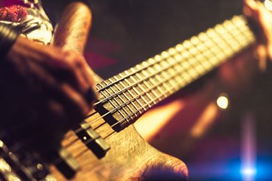Bassist pop rock during a performance at a concert